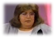 A person looking at the camera
Description generated with very high confidence