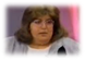 A person looking at the camera
Description generated with very high confidence