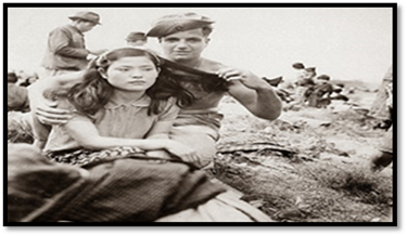 A vintage photo of a group of people posing for the camera

Description generated with very high confidence