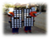 A group of people on a sidewalk

Description generated with high confidence