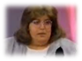 A person looking at the camera
Description generated with very high confidence