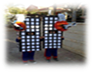 A group of people on a sidewalk
Description generated with high confidence
