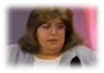 A person looking at the camera

Description generated with very high confidence
